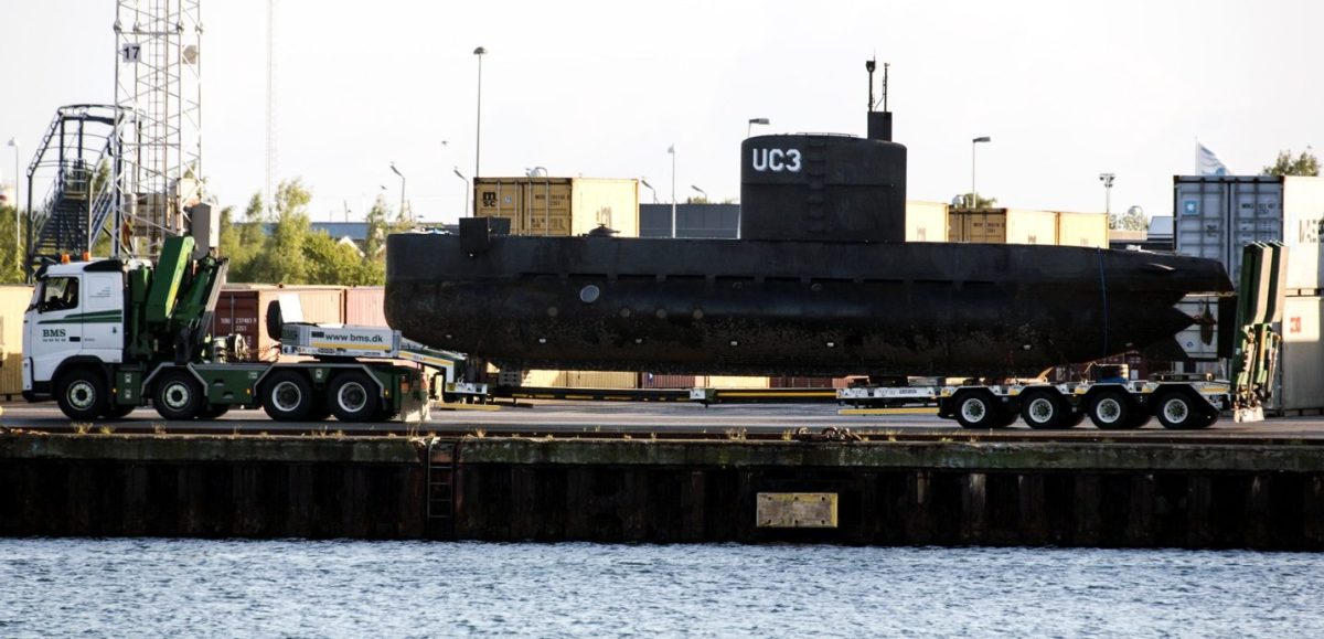 The privately owned submarine, Nautilus, which is the suspected crime scene for the assumed murder on Swedish journalist Kim Wall, is carried out of Copenhagen harbor on a truck for further forensic police investigation taking place near the harbor on August 13, 2017 in Copenhagen, Denmark. (Ole Jensen - Corbis/Corbis via Getty Images)