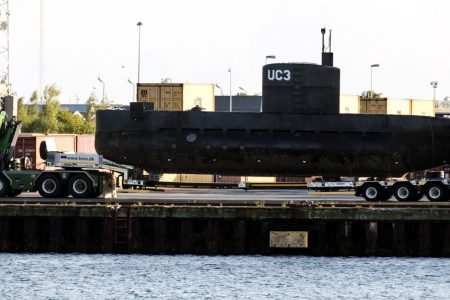 The privately owned submarine, Nautilus, which is the suspected crime scene for the assumed murder on Swedish journalist Kim Wall, is carried out of Copenhagen harbor on a truck for further forensic police investigation taking place near the harbor on August 13, 2017 in Copenhagen, Denmark. (Ole Jensen - Corbis/Corbis via Getty Images)
