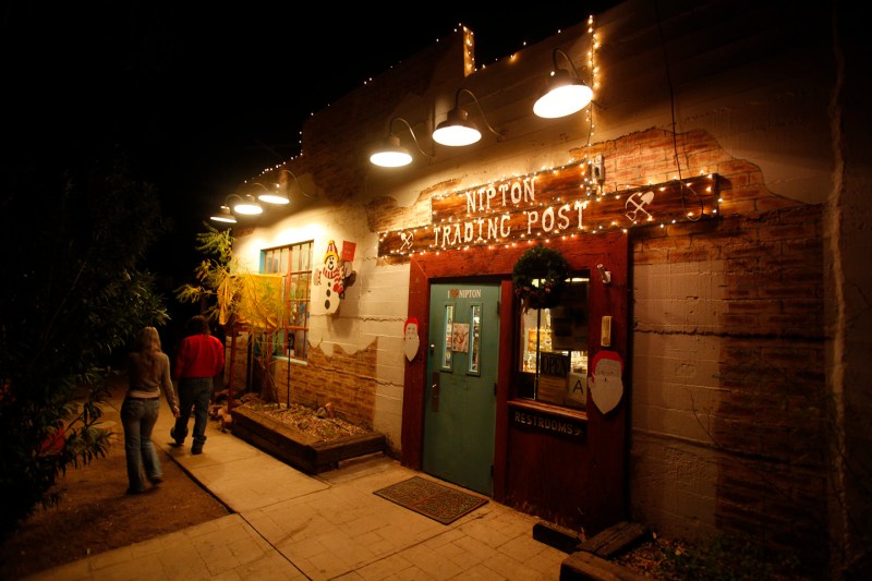 The lights at the Nipton Trading Post glow thanks to the 80 kilowatts of power generated by the small solar plant in Nipton, California December 5, 2012.