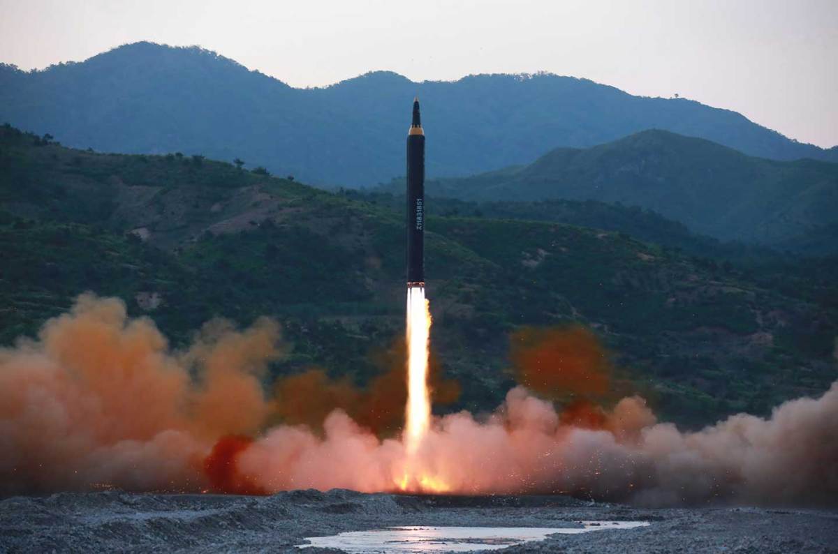 his picture taken on May 14, 2017 and released from North Korea's official Korean Central News Agency (KCNA) on May 15 shows a test launch of the ground-to-ground medium long-range strategic ballistic rocket Hwasong-12 at an undisclosed location.
 (STR/AFP/Getty Images)