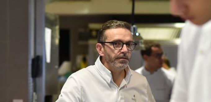 French chef Sebastien Bras looks on in the kitchen of his three-star restaurant Le Suquet, in Laguiole, southern France, on September 21, 2017, after announcing that he asked not to be included in the Michelin Guide starting in 2018. Sebastien Bras, chef of the three-star restaurant Le Suquet, announced on September 20, 2017, he asked not to be included in the Michelin Guide starting in 2018. (AFP PHOTO/REMY GABALDA/Getty)