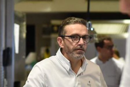 French chef Sebastien Bras looks on in the kitchen of his three-star restaurant Le Suquet, in Laguiole, southern France, on September 21, 2017, after announcing that he asked not to be included in the Michelin Guide starting in 2018. Sebastien Bras, chef of the three-star restaurant Le Suquet, announced on September 20, 2017, he asked not to be included in the Michelin Guide starting in 2018. (AFP PHOTO/REMY GABALDA/Getty)