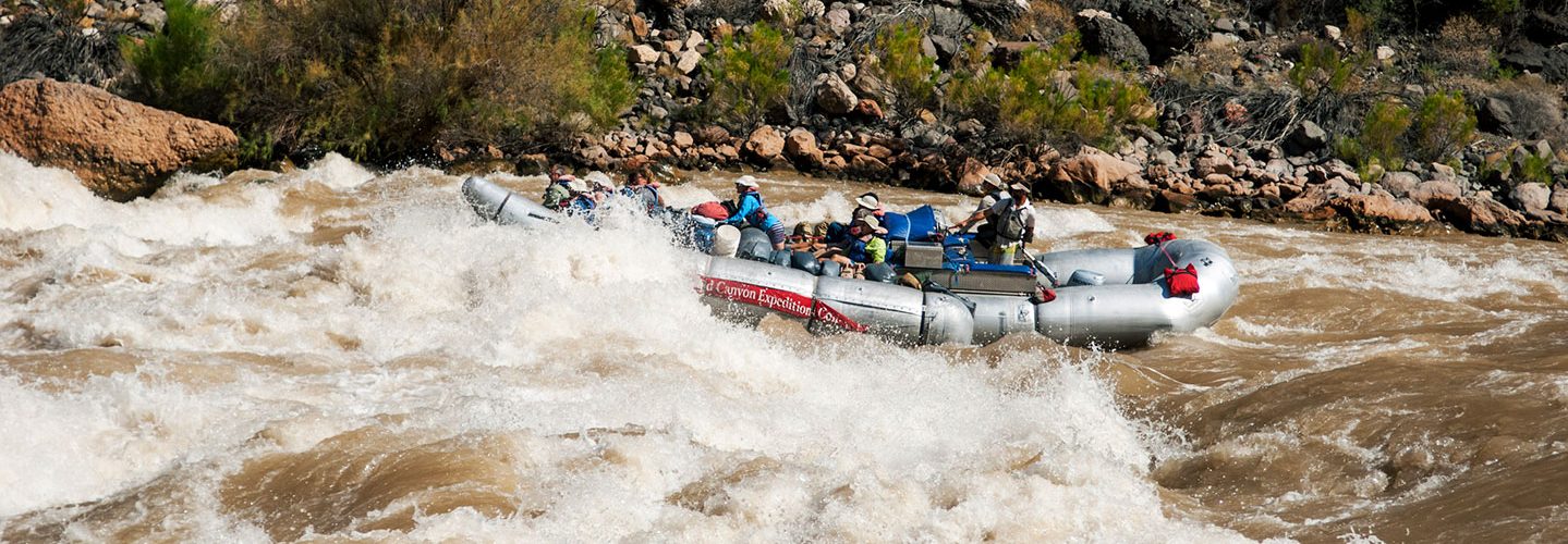 USA, Arizona, Grand Canyon, Commercial motor rig (not Cahill's team) rowing through huge waves at Lava Falls on Colorado River. (John Warburton-Lee/Getty)