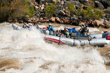 USA, Arizona, Grand Canyon, Commercial motor rig (not Cahill's team) rowing through huge waves at Lava Falls on Colorado River. (John Warburton-Lee/Getty)