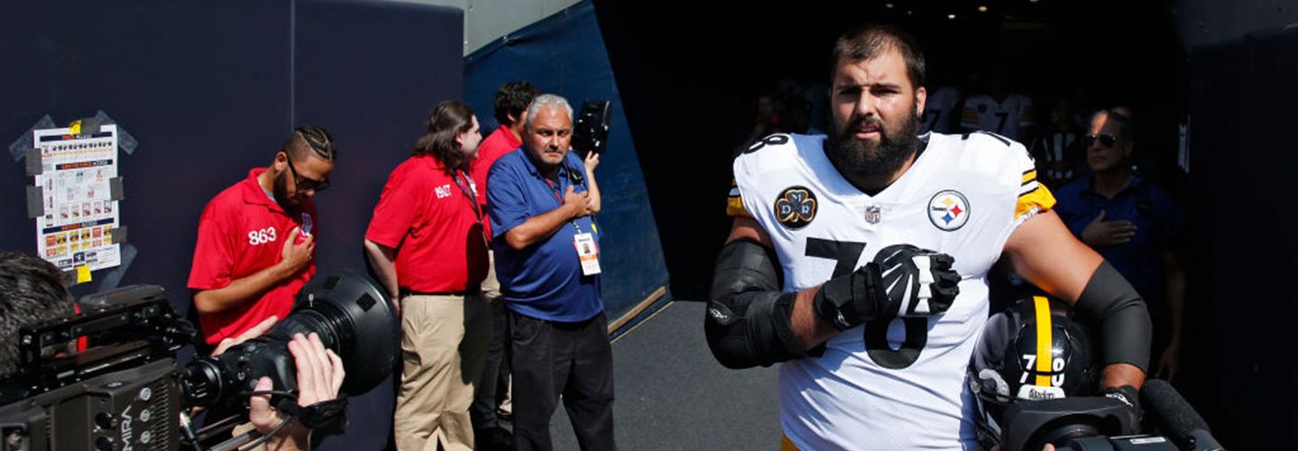 Alejandro Villanueva #78 of the Pittsburgh Steelers stands by himself in the team's tunnel during the national anthem prior to a game against the Chicago Bears at Soldier Field on September 24, 2017 in Chicago, Illinois. Villanueva, a former Army Ranger who served terms in Afghanistan, was the lone Steeler to appear during the anthem. The Bears won 23-17 in overtime. (Photo by Joe Robbins/Getty Images)