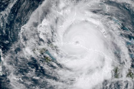 In this satellite image taken Saturday, Sept. 9, 2017, the eye of Hurricane Irma moves northwest just off the coast of Cuba and south of Florida. (NOAA via AP)