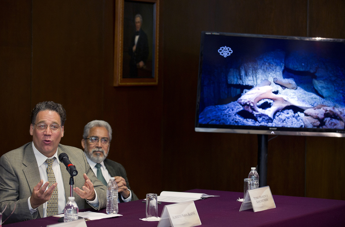 Scientific diver Alberto Nava Blank (L) and Pedro Francisco Sanchez (R) of the Tulum Speleological Project, offer a press conference at the Anthropology National Museum in Mexico City, on May 15, 2014. A teenage girl who fell into a hole more than 12,000 years ago in Mexico's Yucatan Peninsula is offering new clues about the origins of the first Native Americans, researchers said Thursday. Named "Naia" by scientists, her skeleton is among the oldest known and best preserved in the Americas. New bones discovered in a different cave nearby also date back to 13,000 years ago. (ALFREDO ESTRELLA/AFP/Getty Images)