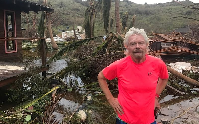 Richard Branson stands in front of the staff village on Necker Island following the devastation from Hurricane Irma. (Image Virgin.com)