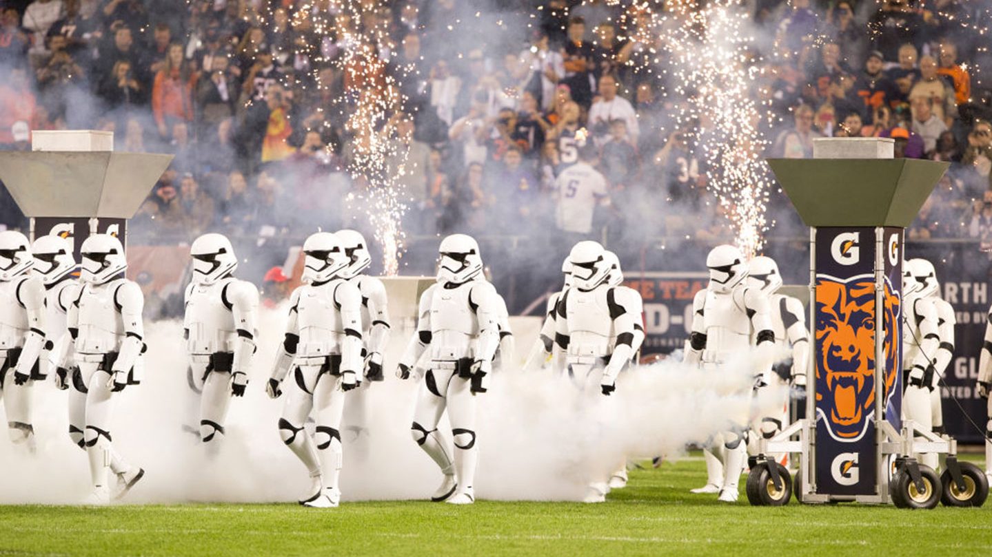 Storm troopers take the field during a special halftime showing of the new Star Wars movie Star Wars: The Last Jedi at Soldier Field during the game between the Chicago Bears and the Minnesota Vikings on October 9, 2017 in Chicago, Illinois. (Photo by Kena Krutsinger/Getty Images)