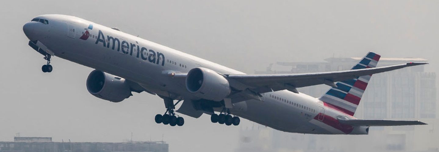 A Boeing 777 passenger plane belonging to the American Airlines flies into the clouds after lifting off from Hong Kong International Airport, on 23 October 2017, in Hong Kong, Hong Kong. (Photo by studioEAST/Getty Images)