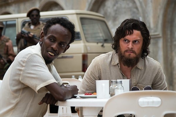 Evan Peters and Barkhad Abdi in The Pirates of Somalia. (IMDB)