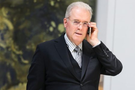 Billionaire Robert Mercer speaks on the phone during the 12th International Conference on Climate Change hosted by The Heartland Institute on March 23, 2017 in Washington, D.C. (Photo by Oliver Contreras/For The Washington Post via Getty Images)