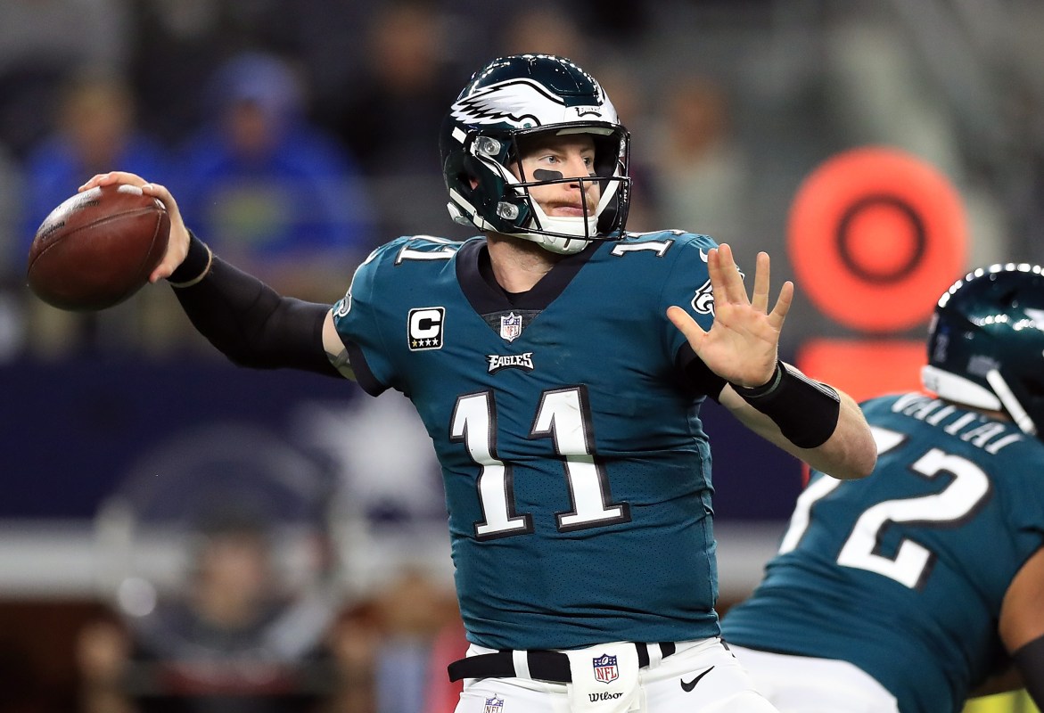 Carson Wentz #11 of the Philadelphia Eagles throws against the Dallas Cowboys in the first half at AT&T Stadium on November 19, 2017 in Arlington, Texas.  (Photo by Ronald Martinez/Getty Images)