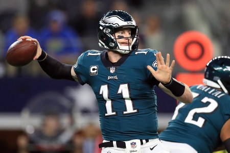 Carson Wentz #11 of the Philadelphia Eagles throws against the Dallas Cowboys in the first half at AT&T Stadium on November 19, 2017 in Arlington, Texas.  (Photo by Ronald Martinez/Getty Images)