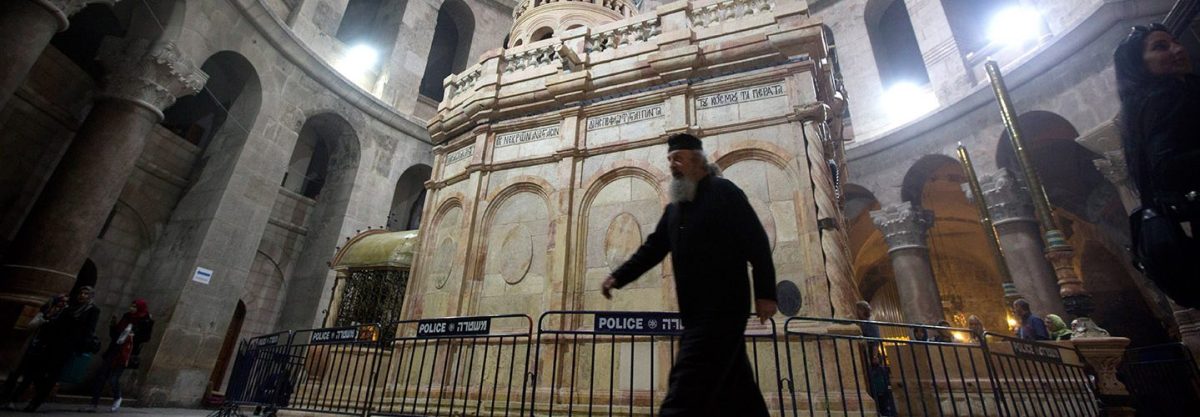 A priest walks outside the tomb of Jesus Christ  in the Church of the Holy Sepulchre on March 21, 2017 in Jerusalem, Israel. (Lior Mizrahi/Getty Images)