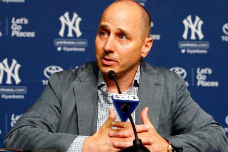 New York Yankees general manager Brian Cashman speaks during a news conference on August 7, 2016 at Yankee Stadium in the Bronx borough of New York City.  (Photo by Jim McIsaac/Getty Images)