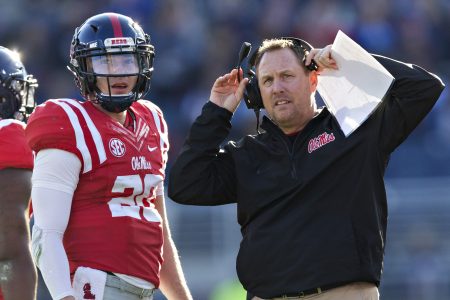 Head Coach Hugh Freeze talks with Shea Patterson #20 of the Mississippi Rebels during a game against the Mississippi State Bulldogs at Vaught-Hemingway Stadium on November 26, 2016 in Oxford, Mississippi.  (Wesley Hitt/Getty Images)