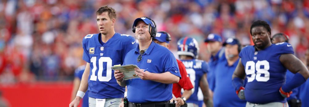 Head coach Ben McAdoo and Eli Manning #10 of the New York Giants react on the sideline in the fourth quarter of a game against the Tampa Bay Buccaneers at Raymond James Stadium on October 1, 2017 in Tampa, Florida. The Bucs defeated the Giants 25-23. (Photo by Joe Robbins/Getty Images)