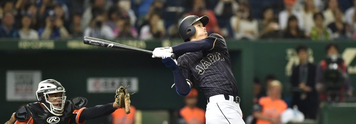 Japan's baseball star Shohei Ohtani hits a double in the seventh inning during the game between Japan and the Netherlands at the Tokyo Dome on November 13, 2016. (KAZUHIRO NOGI/AFP/Getty Images)