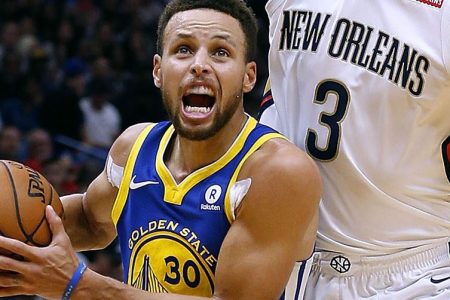 Stephen Curry #30 of the Golden State Warriors drives against Omer Asik #3 of the New Orleans Pelicans. (Photo by Jonathan Bachman/Getty Images)
