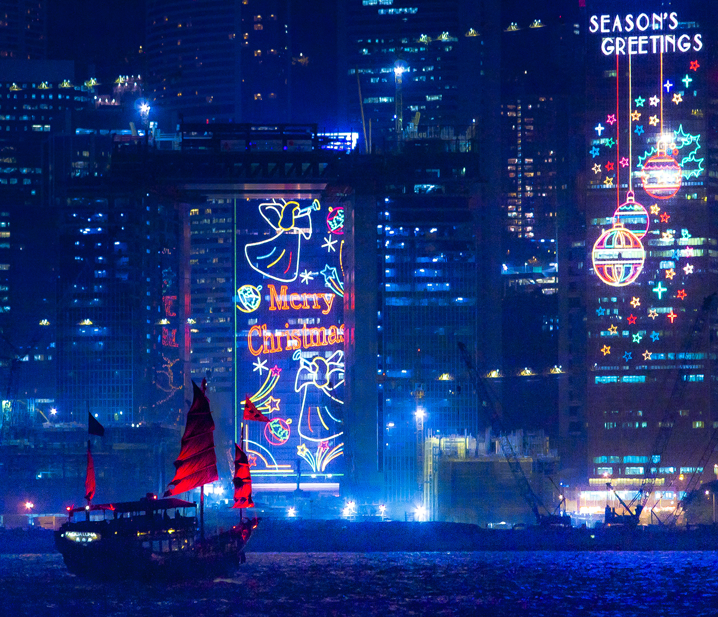 Christmas decorations on the facades of the high rises of Hong Kong Island. (Getty Images)