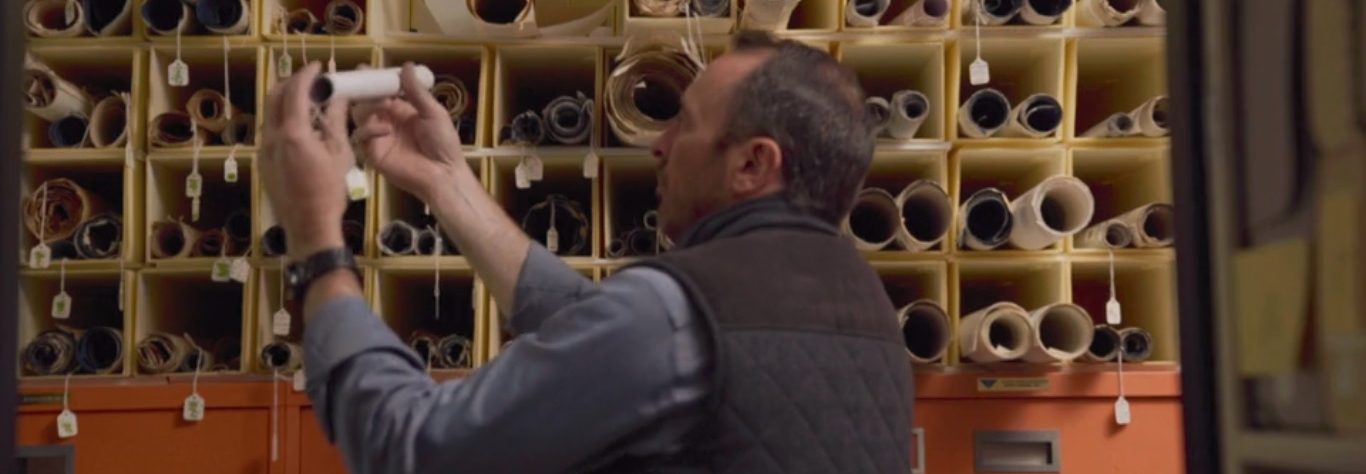 Cameron Prince, co-host of Discovery's "Tesla's Death Ray: A Murder Declassified," searches the archives in Nikola Tesla Museum in Belgrade, Serbia. (Discovery)