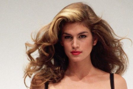 Cindy Crawford models Dolce e Gabbana clothes at a fashion show in Milan. (Photo by Vittoriano Rastelli/CORBIS/Corbis via Getty Images)