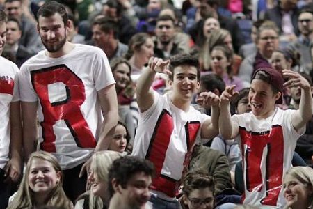 Liberty University students (L-R) Austin Miller, James Ford, Jeremy Boyd, Josiah O'Boyle and Cody Hildebrand wear home made t-shirts spelling 'TRUMP' while waiting for the arrival of Republican presidential candidate Donald Trump during a campaign rally in the Vines Center at the university  January 18, 2016 in Lynchburg, Virginia. (Chip Somodevilla/Getty Images)