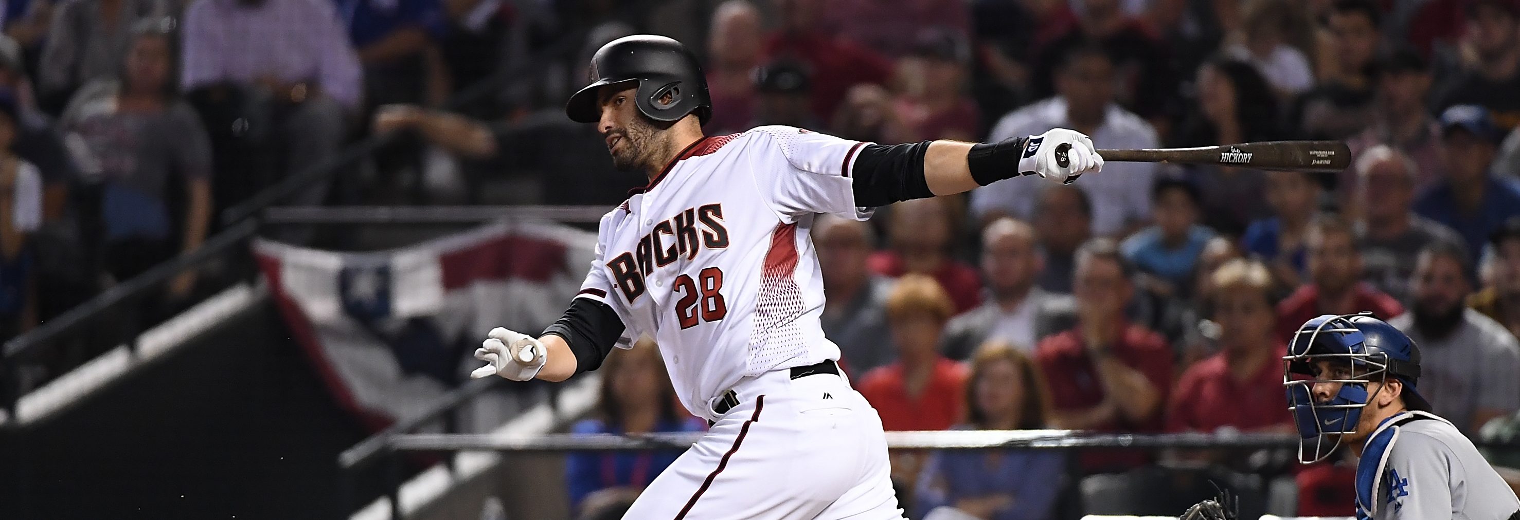JD Martinez #28 of the Arizona Diamondbacks follows through on a swing during game three of the National League Divisional Series against the Los Angeles Dodgers at Chase Field on October 9, 2017 in Phoenix, Arizona. (Photo by Norm Hall/Getty Images)