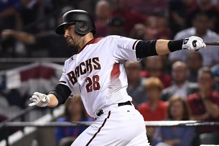 JD Martinez #28 of the Arizona Diamondbacks follows through on a swing during game three of the National League Divisional Series against the Los Angeles Dodgers at Chase Field on October 9, 2017 in Phoenix, Arizona.  (Photo by Norm Hall/Getty Images)