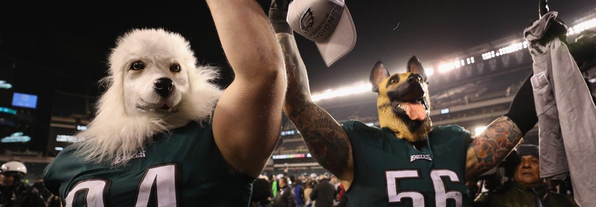 Beau Allen #94 and Chris Long #56 of the Philadelphia Eagles celebrates their teams win while wearing a dog masks over the Minnesota Vikings in the NFC Championship game at Lincoln Financial Field on January 21, 2018 in Philadelphia, Pennsylvania.  (Patrick Smith/Getty Images)