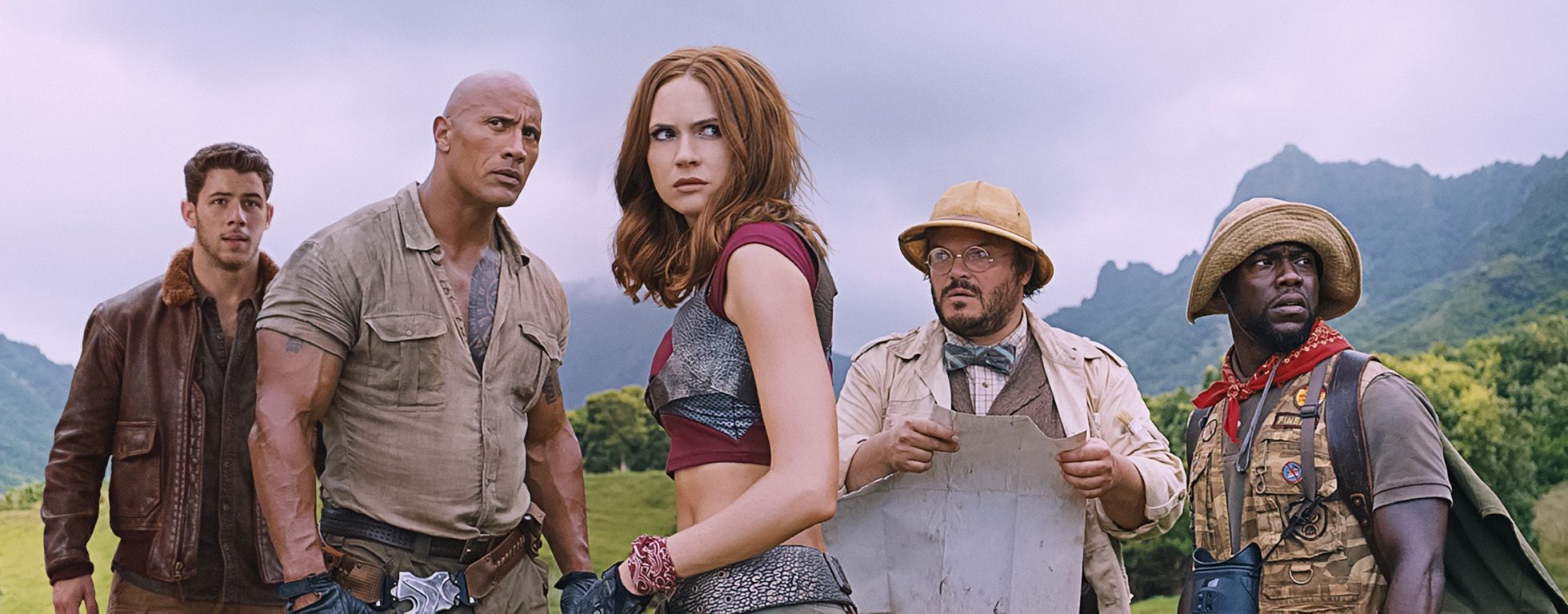 (From l.) Nick Jonas, Dwayne Johnson, Karen Gillan, Kevin Hart and Jack Black star in JUMANJI: WELCOME TO THE JUNGLE. (SONY)