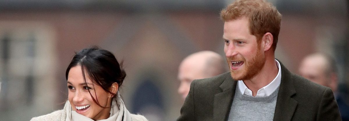 Prince Harry (R) and his fiancee Meghan Markle