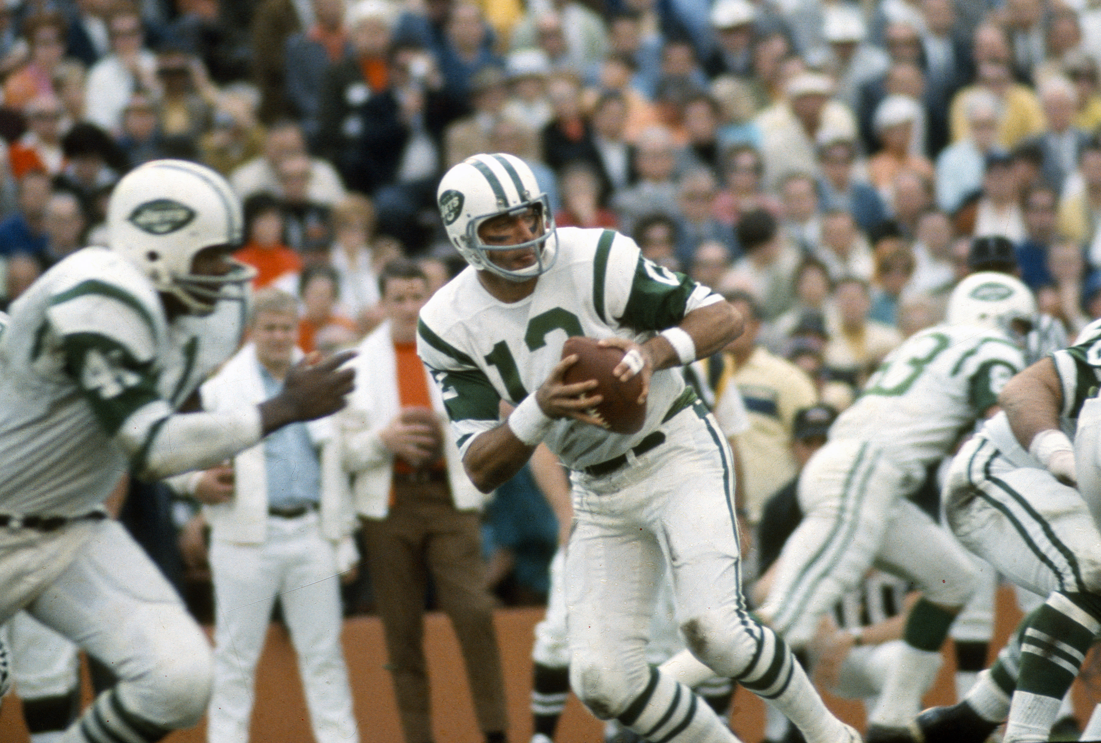Joe Namath #12 of the New York Jets drops back to pass against the Baltimore Colts during Super Bowl III at the Orange Bowl on January 12, 1969 in Miami, Florida. The Jets defeated the Colts 16-7. (Focus on Sport/Getty Images)