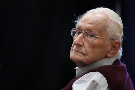 Defendant and German former SS officer Oskar Groening , 94, dubbed the "bookkeeper of Auschwitz", sits on July 1, 2015 at the courtroom at the 'Ritterakademie' venue in Lueneburg, northern Germany ahead of his trial. Groening and a survivor of the Nazi death camp testify in a German court as his historic trial nears a verdict. (Ronny Hartmann/AFP/Getty)