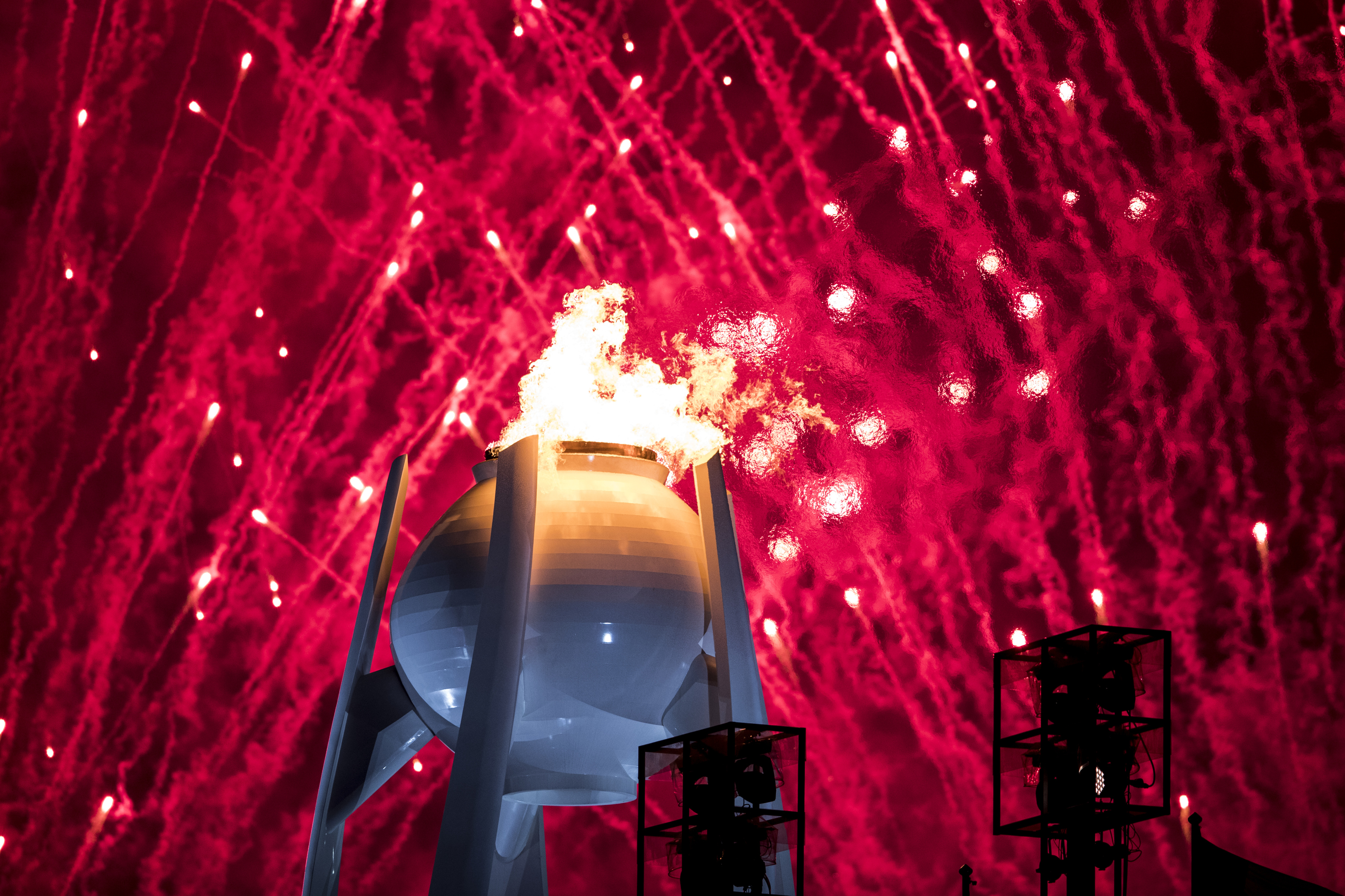 PYEONGCHANG-GUN, SOUTH KOREA - FEBRUARY 09: Fireworks erupt as the Olympic Cauldron is lit during the Opening Ceremony of the PyeongChang 2018 Winter Olympic Games at PyeongChang Olympic Stadium on February 9, 2018 in Pyeongchang-gun, South Korea. (Photo by XIN LI/Getty Images)