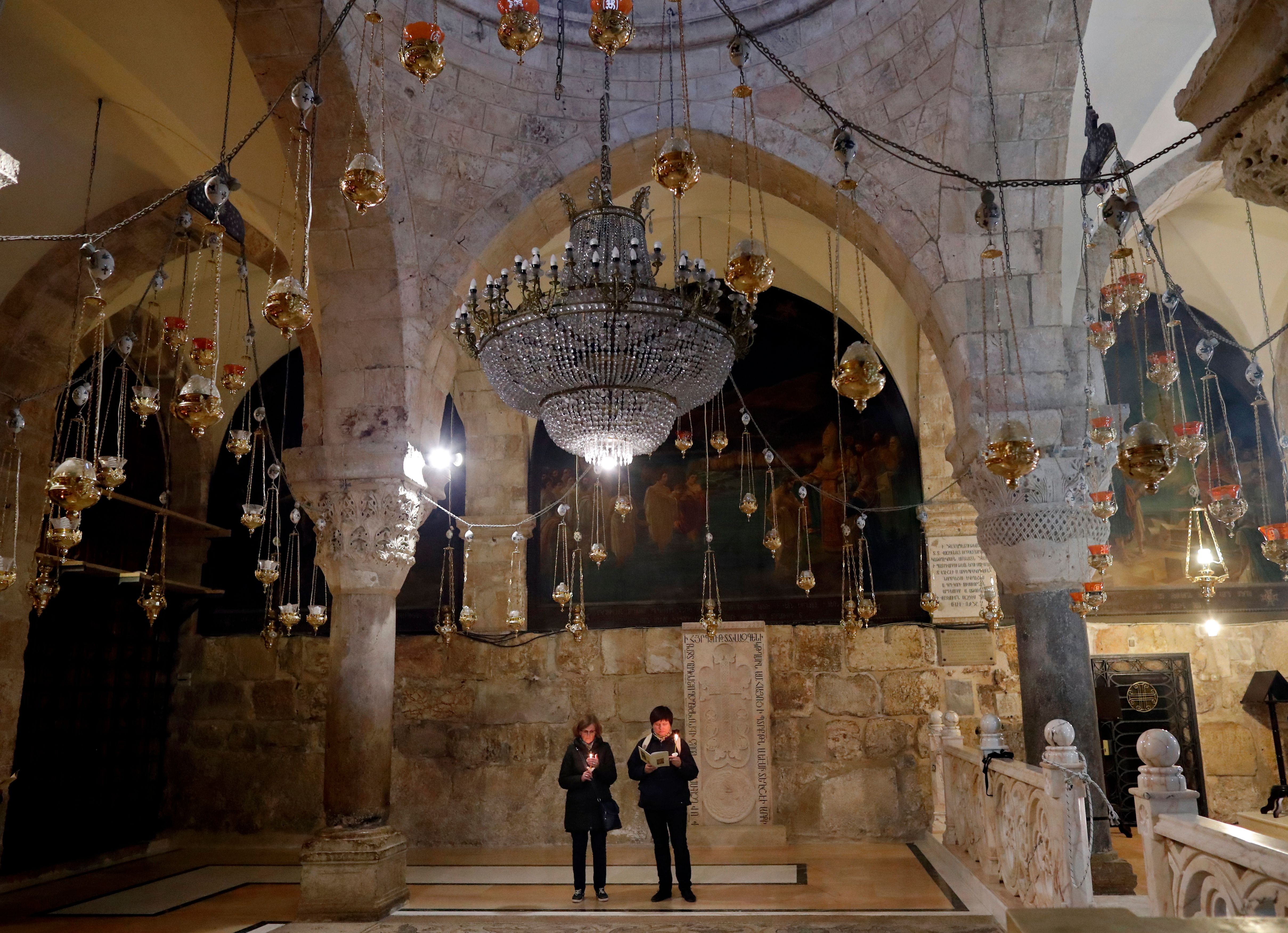 Christian worshippers pray at the Saint Helena chapel inside the Church of the Holy Sepulchre during a procession in the Old City of Jerusalem, on February 15, 2018. (THOMAS COEX/AFP/Getty Images)