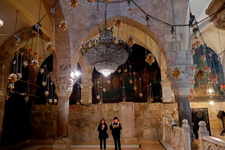 Christian worshippers pray at the Saint Helena chapel inside the Church of the Holy Sepulchre during a procession in the Old City of Jerusalem, on February 15, 2018. (THOMAS COEX/AFP/Getty Images)