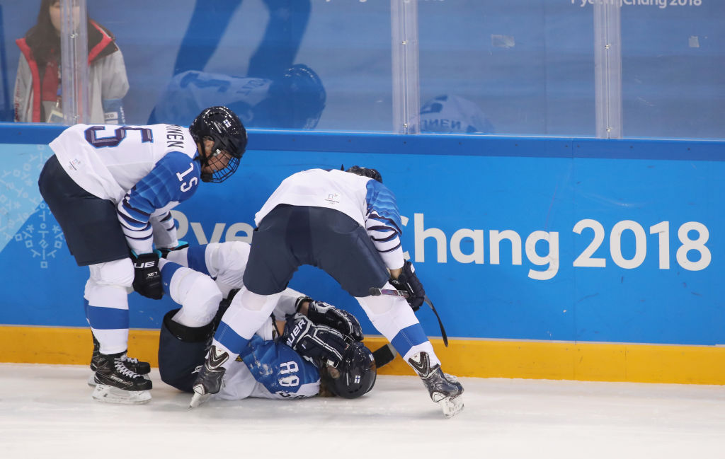 Ronja Savolainen #88 of Finland  is attended to after colliding with Meghan Duggan #10 of the United States  during the Ice Hockey Women Play-offs Semifinals on day 10 of the PyeongChang 2018 Winter Olympic Games at Gangneung Hockey Centre on February 19, 2018 in Pyeongchang-gun, South Korea.  (Photo by Bruce Bennett/Getty Images)