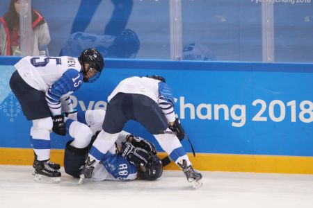 Ronja Savolainen #88 of Finland  is attended to after colliding with Meghan Duggan #10 of the United States  during the Ice Hockey Women Play-offs Semifinals on day 10 of the PyeongChang 2018 Winter Olympic Games at Gangneung Hockey Centre on February 19, 2018 in Pyeongchang-gun, South Korea.  (Photo by Bruce Bennett/Getty Images)