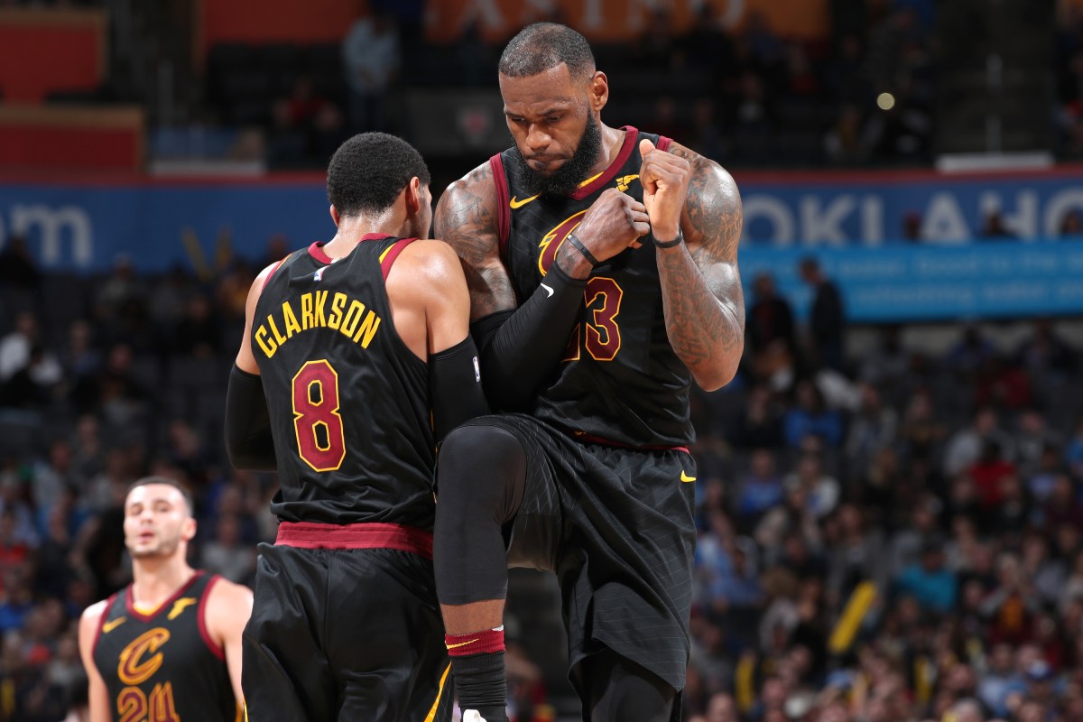 Jordan Clarkson #8 and LeBron James #23 of the Cleveland Cavaliers celebrate during the game against the Oklahoma City Thunder on February 13, 2018 at Chesapeake Energy Arena in Oklahoma City, Oklahoma. NOTE TO USER: User expressly acknowledges and agrees that, by downloading and/or using this photograph, user is consenting to the terms and conditions of the Getty Images License Agreement. Mandatory Copyright Notice: Copyright 2018 NBAE (Photo by Joe Murphy/NBAE via Getty Images)