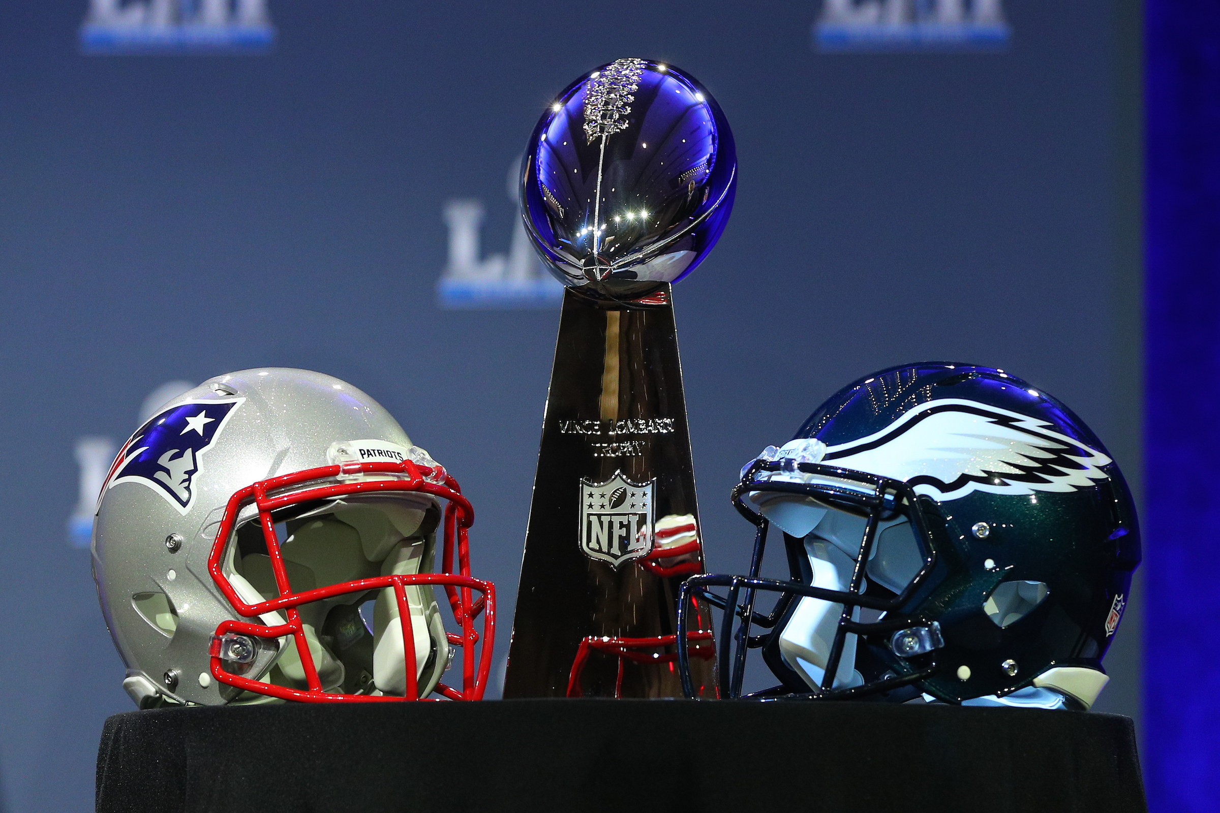 The Vince Lombardi Trophy and the New England Patriots helmet and the Philadelphia Eagles helmet on display at the Commissioners Press Conference on January 31, 2018, at the Hilton Minneapolis Grand Ballroom, in Minneapolis, MN. (Photo by Rich Graessle/Icon Sportswire via Getty Images)
