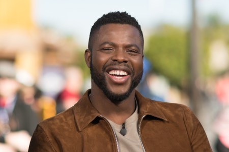 Winston Duke takes a selfie with fans at "Extra" at Universal Studios Hollywood on February 19, 2018 in Universal City, California.  (Photo by Noel Vasquez/Getty Images)