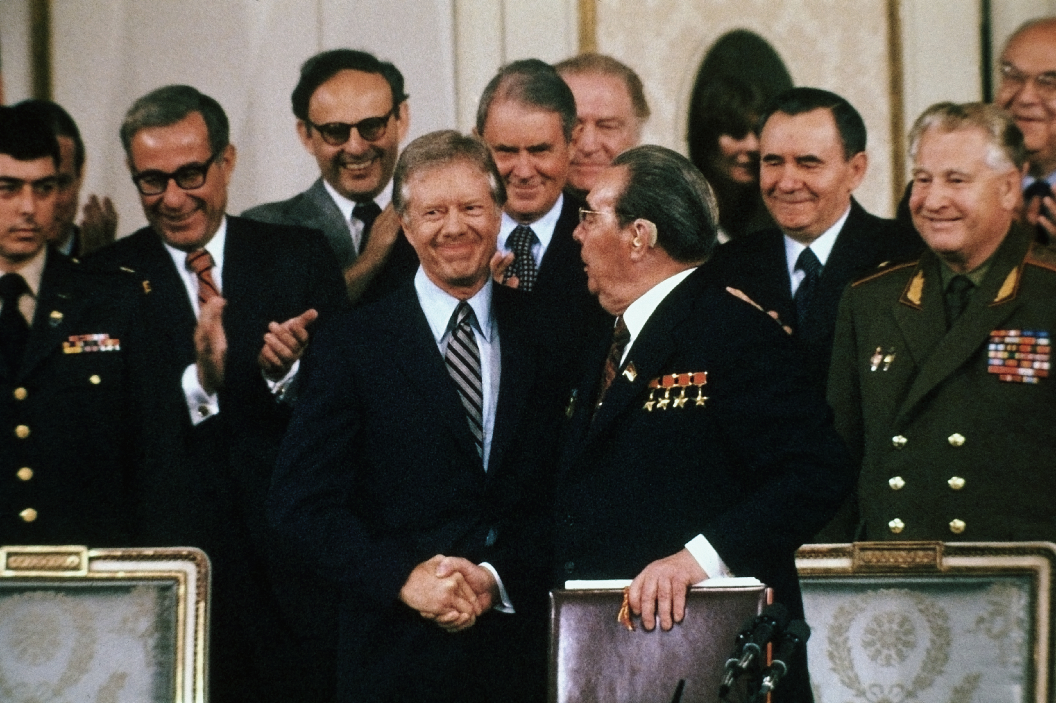U. S. President Jimmy Carter and Soviet Premier Leonid Brezhnev shake hands after signing the SALT II Treaty in Vienna. (Getty)