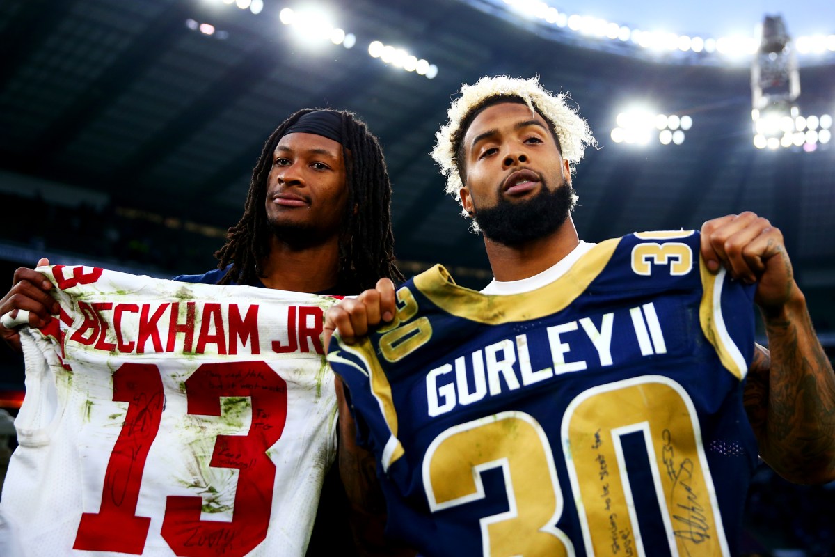 Odell Beckham #13 of the New York Giants and  Todd Gurley #30 of the Los Angeles Rams swap signed shirts after the NFL International series game between Los Angeles Rams and New York Giants at Twickenham Stadium in London, England.  (Photo by Dan Istitene/Getty Images)