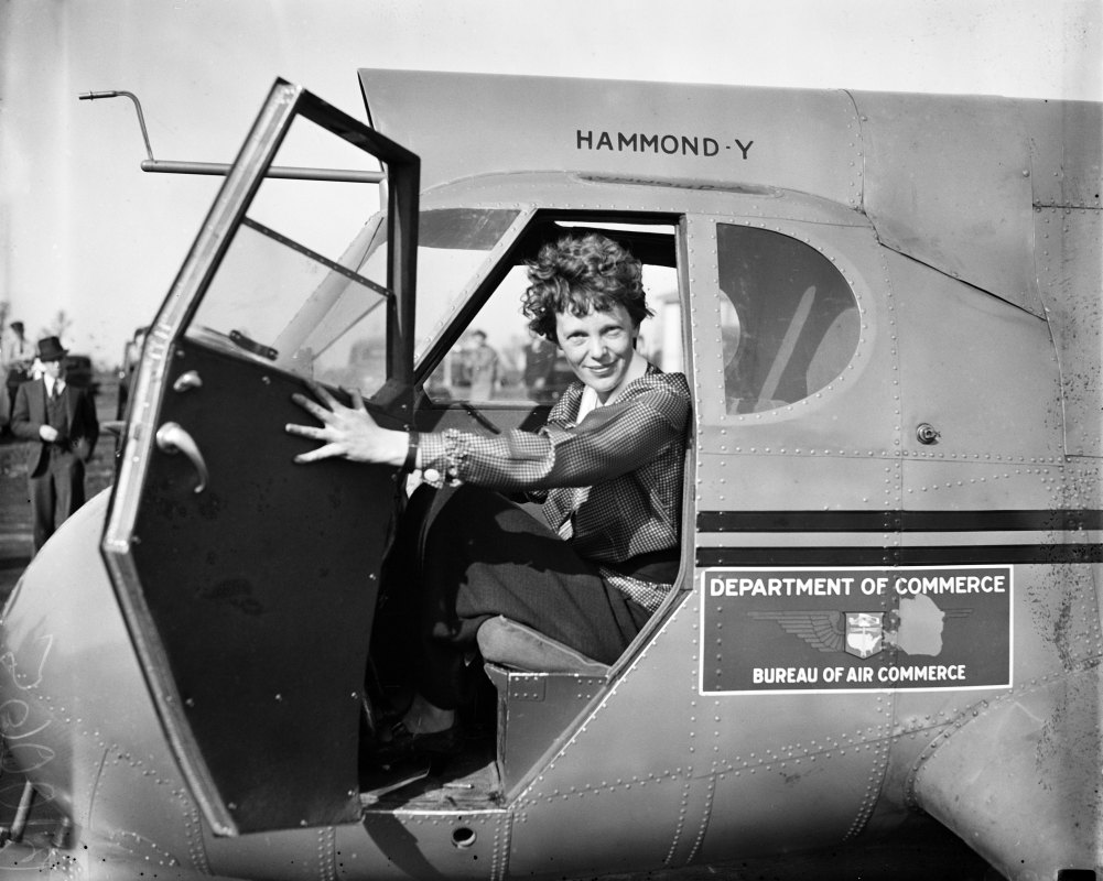 Pilot Amelia Earhart poses for a portrait in and airplane in circa 1936. (Library of Congress/Getty Images)