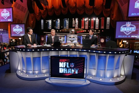 The ESPN broadcast team of (L-R) Mel Kiper, Chris Mortensen, and Steve Young prepare for the 2008 NFL Draft on April 26, 2008 at Radio City Music Hall in New York, New York.  (Photo by Jim McIsaac/Getty Images)