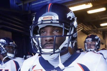 Aqib Talib #21 of the Denver Broncos and teammates make their way onto the field before the start of NFL game action against the Buffalo Bills at New Era Field. (Photo by Tom Szczerbowski/Getty Images)