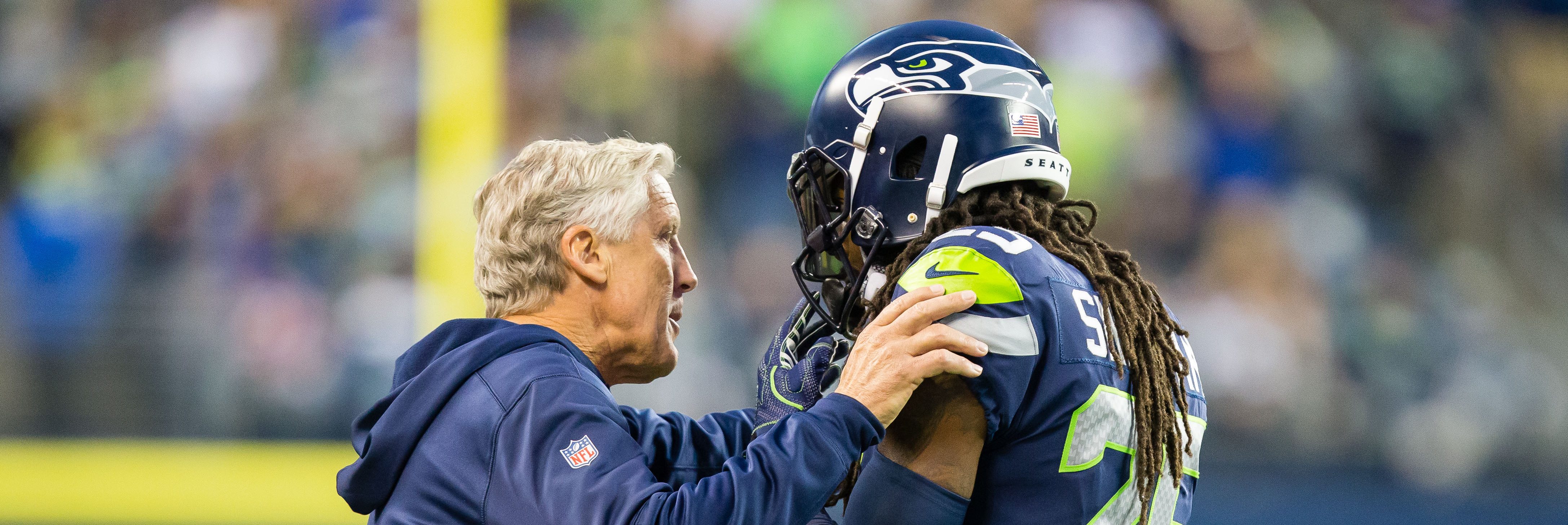 Head coach Pete Carroll talks to Richard Sherman (25) of the Seattle Seahawks during a game between the Seattle Seahawks and the Indianapolis Colts on October 01, 2017. (Photo by Christopher Mast/Icon Sportswire via Getty Images)