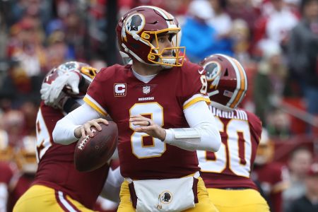 Ex-Redskins quarterback Kirk Cousins  looks to pass in the second quarter against the Arizona Cardinals at FedEx Field on December 17, 2017. (Photo by Rob Carr/Getty Images)